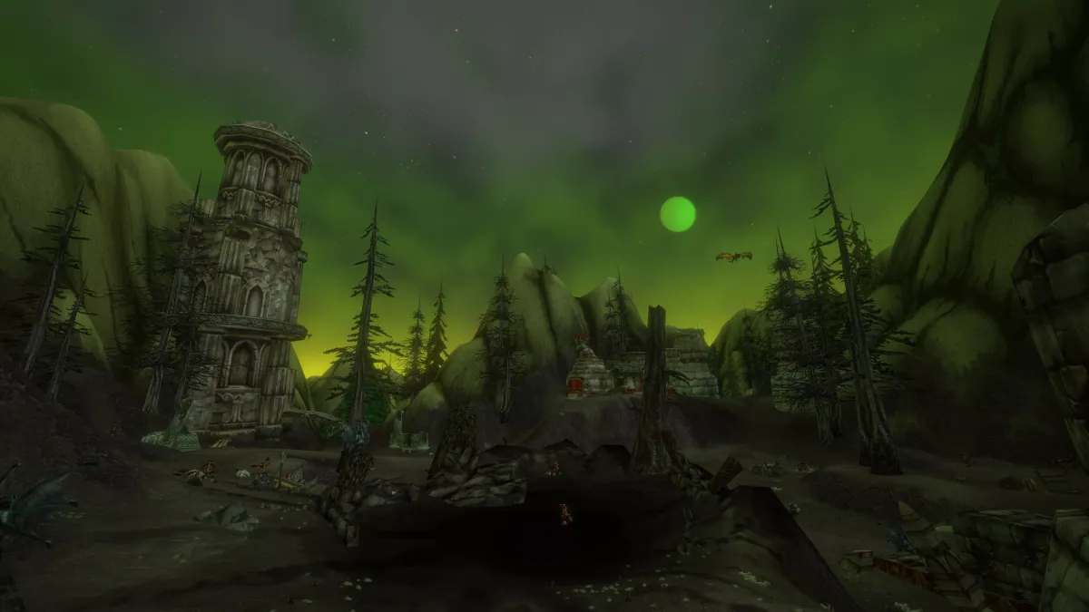 A ruined stone tower beneath a fel-green sky on Mount Hyjal
